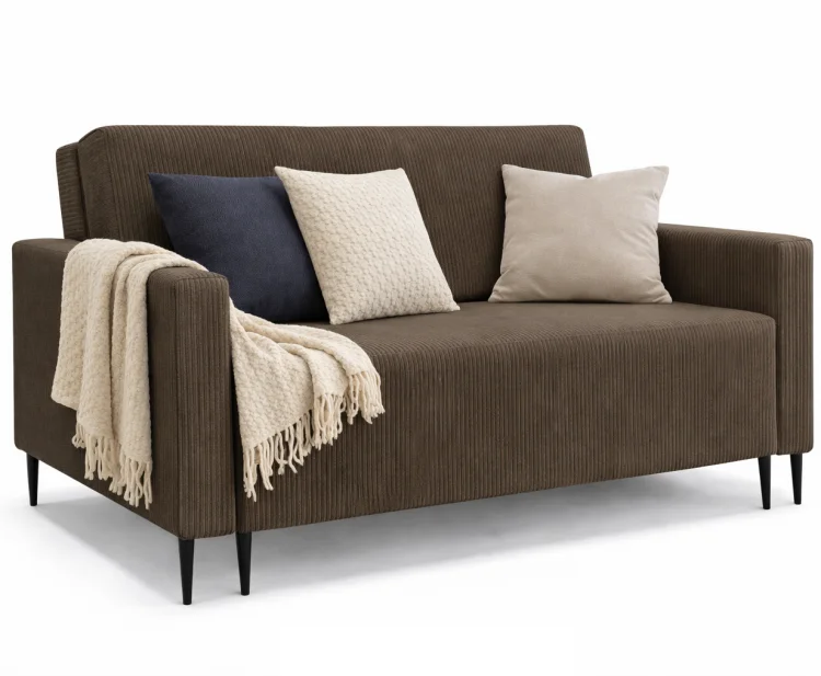 Brązowa sofa LAURA GERMAN z poduszkami i kocem