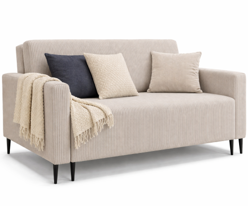 Beżowa sofa LAURA GERMAN z poduszkami na białym tle