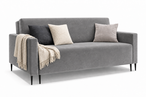 Szara welurowa sofa MAJA GERMAN z poduszkami i kocem